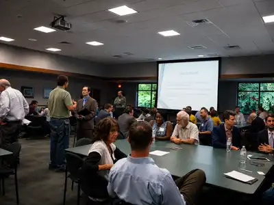 Professionals networking at a Toledo Web Professionals event