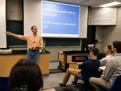 Toledo professionals participating in a local technology event