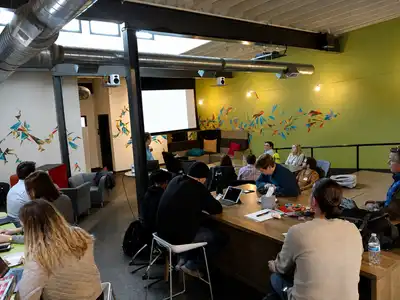 Community members learning together at a workshop